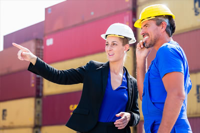 Freight Forwarder discussing a shipment with a Dock Loader