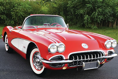 Gorgeous red Corvette... precious cargo indeed!